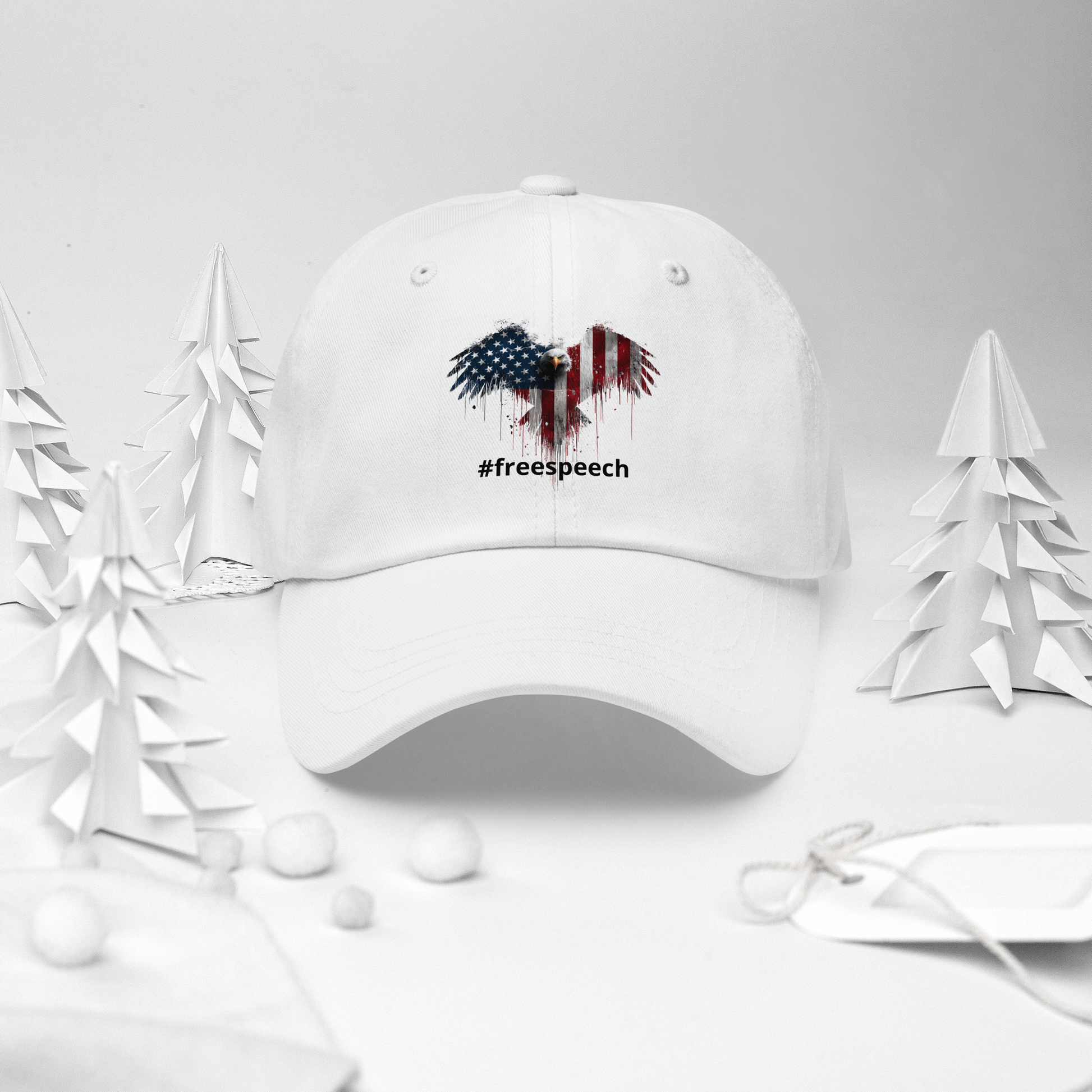 White cap with '#freespeech' design on a white background